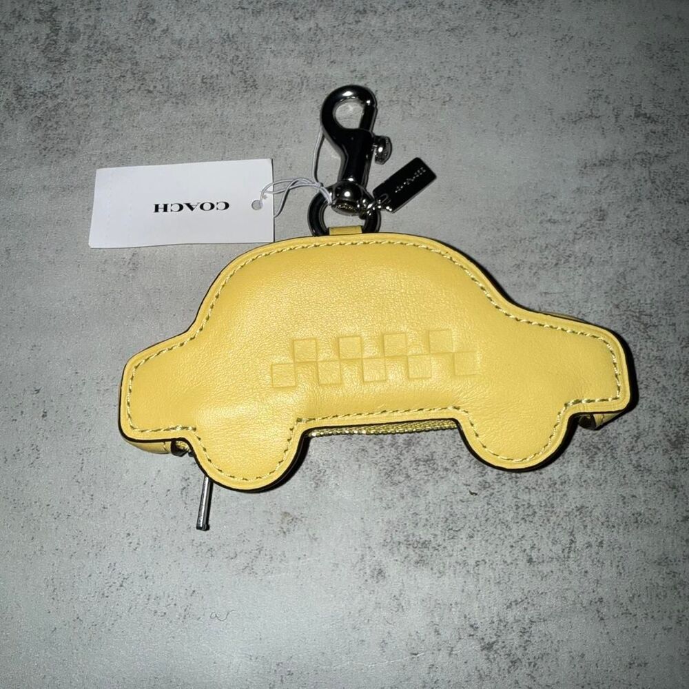 Coach yellow taxi keychain